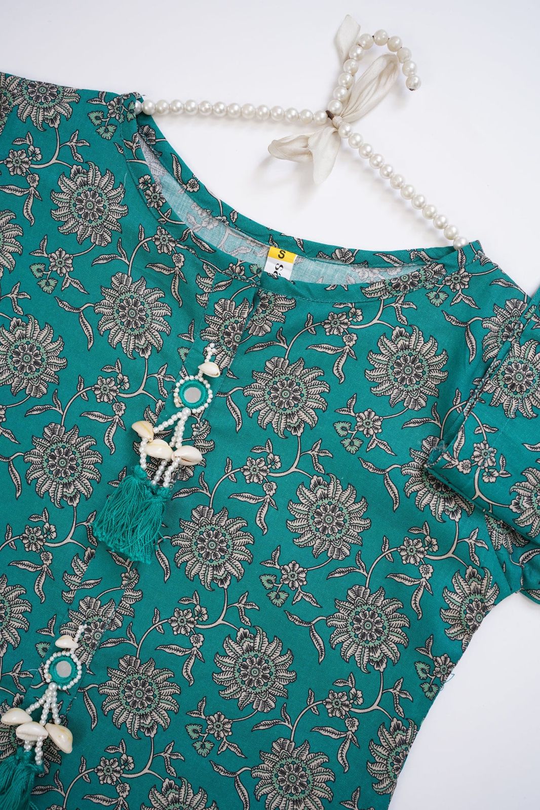 2-Piece Stitched Khaddar Suit – Teal Green with Traditional Floral Motifs and Shell Tassels
