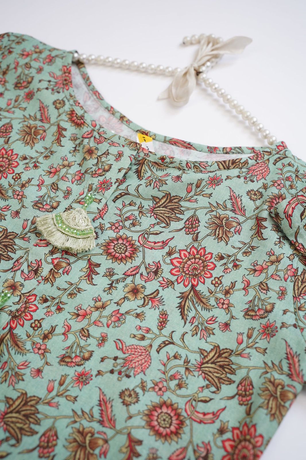 2-Piece Stitched Khaddar Suit – Mint Green Floral Print with Chic Tassel Accents